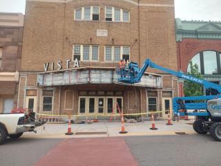 Vista Theater Marquee with construction equipment in front of it
